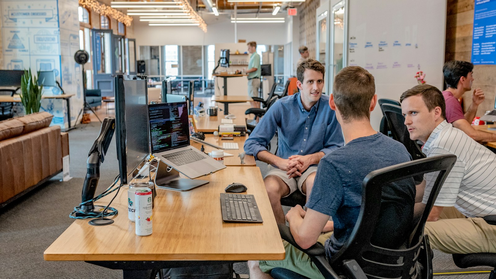 Business team reviewing customer follow-up together